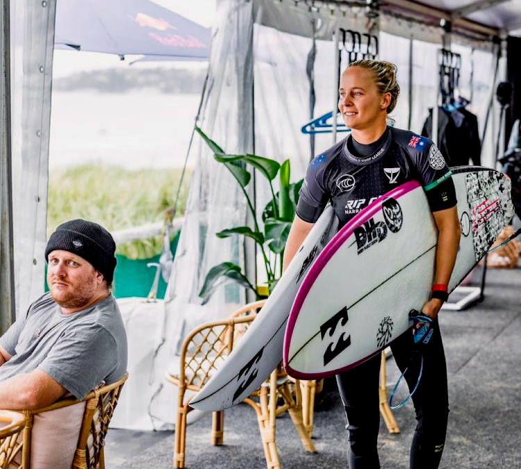 Professional Australian Surfer Isabella Nichols at the 2021 Narrabeen WSL Surf Competition with Surflogic Hardware Wetsuit Dryer and Wetsuit Hangers in the Red Bull Athlete Zone