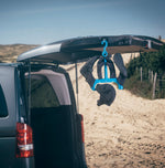 Magnetic Wetsuit Suction Hook From Surflogic Australia Shown Hanging on a Car