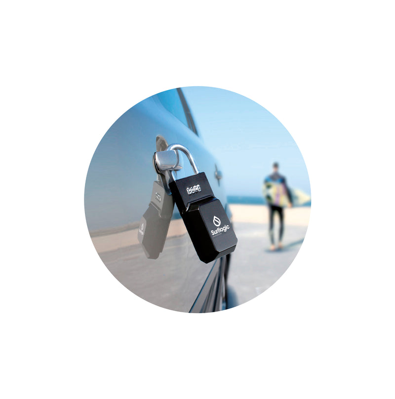 Surflogic Standard Black Surf Safe Secured on Car Door Handle and Surfer walking with Shortboard to Surf at the Beach